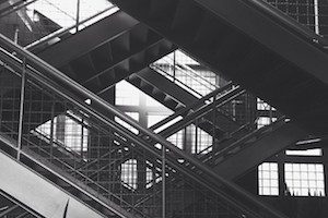 A set of staircases in black and white.